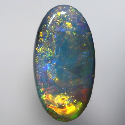 SOLID SEMI BLACK OPAL Golds over green and blue